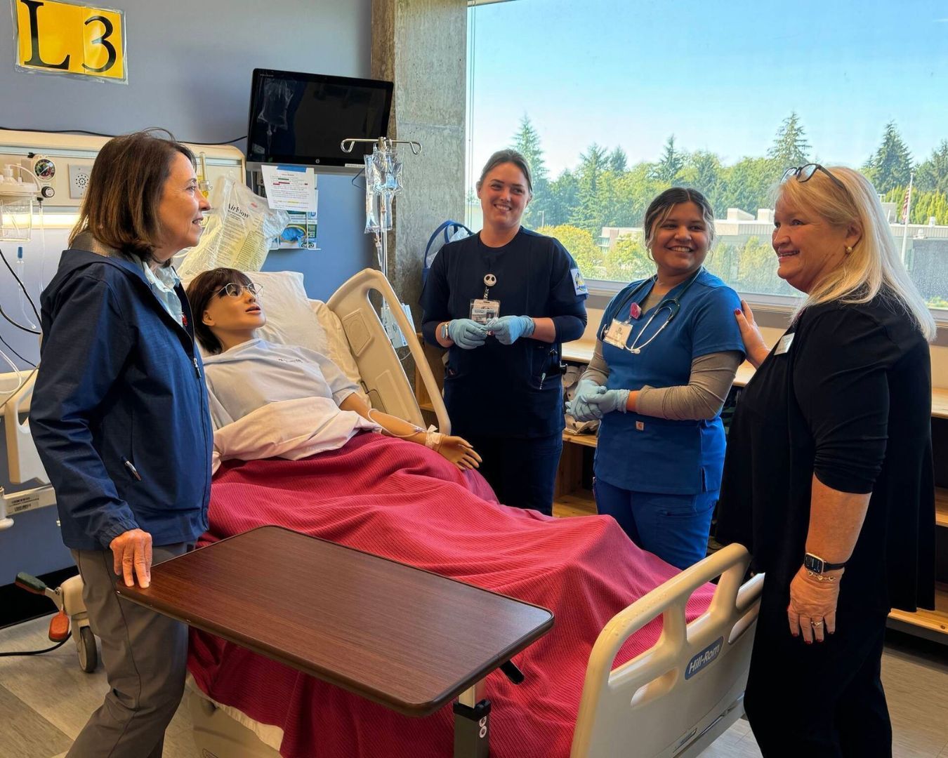 Associate Dean of Nursing Carol O’Neal and students show Sen. Maria Cantwell around GHC’s Simulation Lab during a visit to campus last summer. Michael S. Lockett / The Daily World.