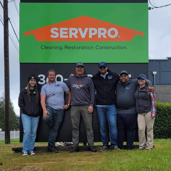 Members of the CMD team pose for a photo after completing a job for SERVPRO.