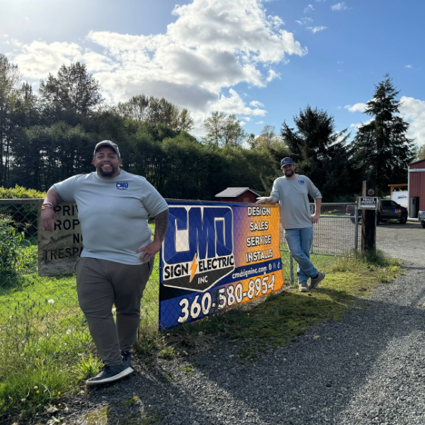 Marcus and Chris at CMD Sign & Electric Inc. in Montesano.